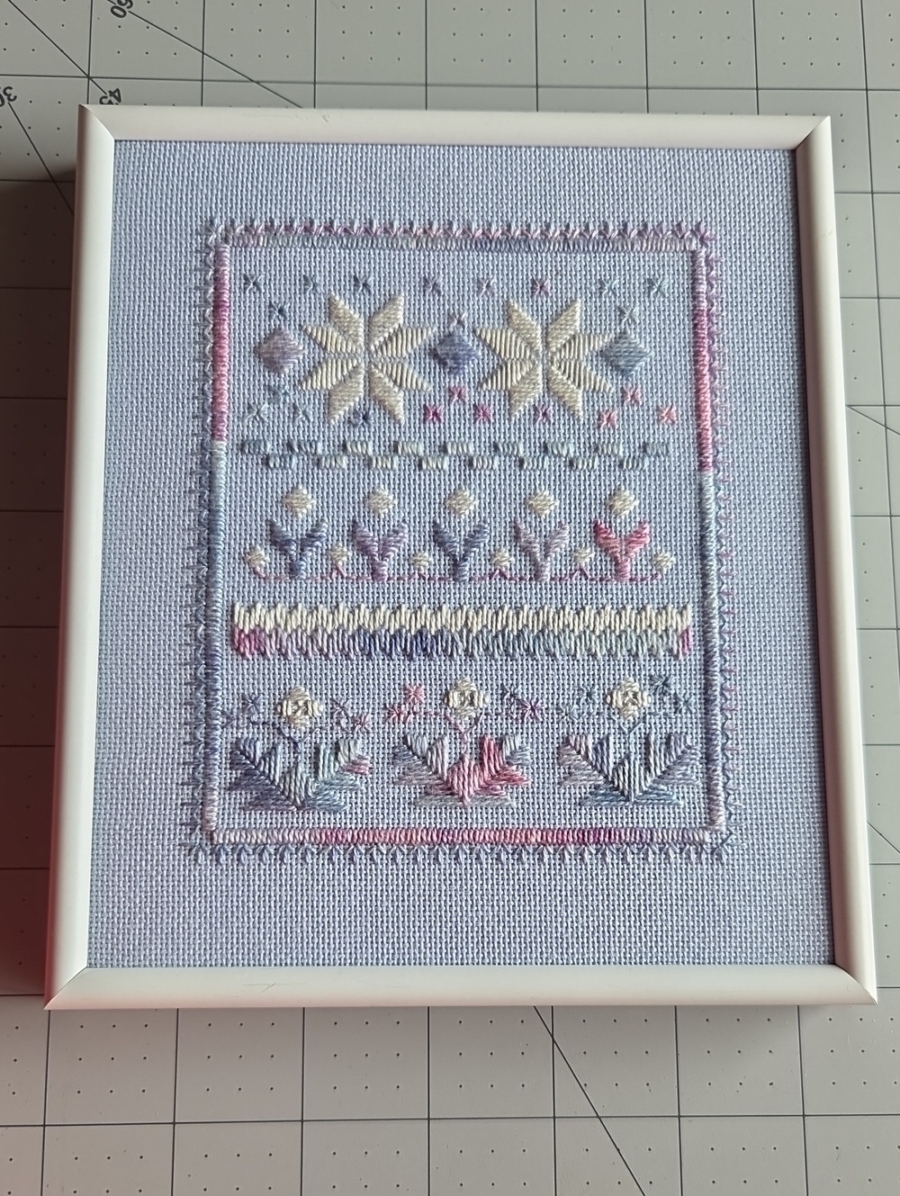Hand-Embroidered Floral Cross Stitch Wall Art in Pastel Colors